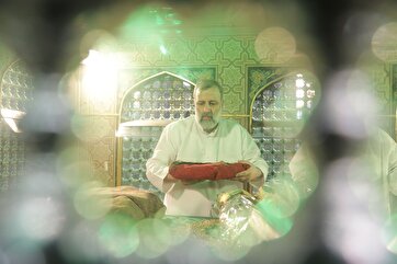 Late President Raisi’s Dusting of Imam Reza Shrine