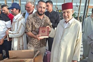Тақдими Қуръон ба мусофирони воридшуда дар фурудгоҳи Алаурии Марокаш + аксҳо